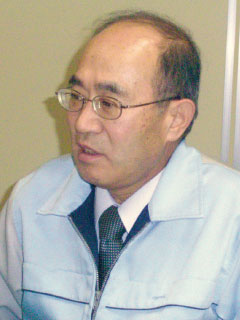 丸山 栄家 氏